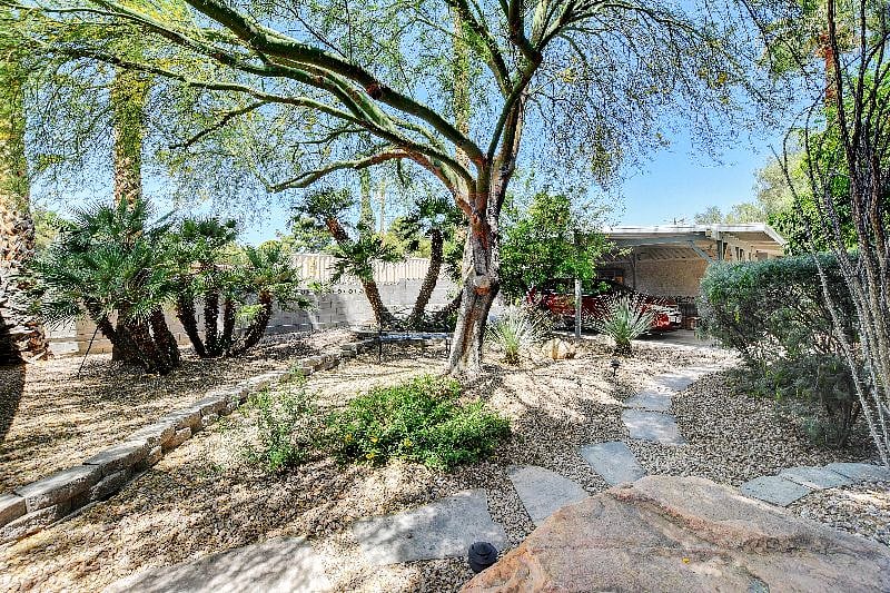Mature landscaping next to parking spot