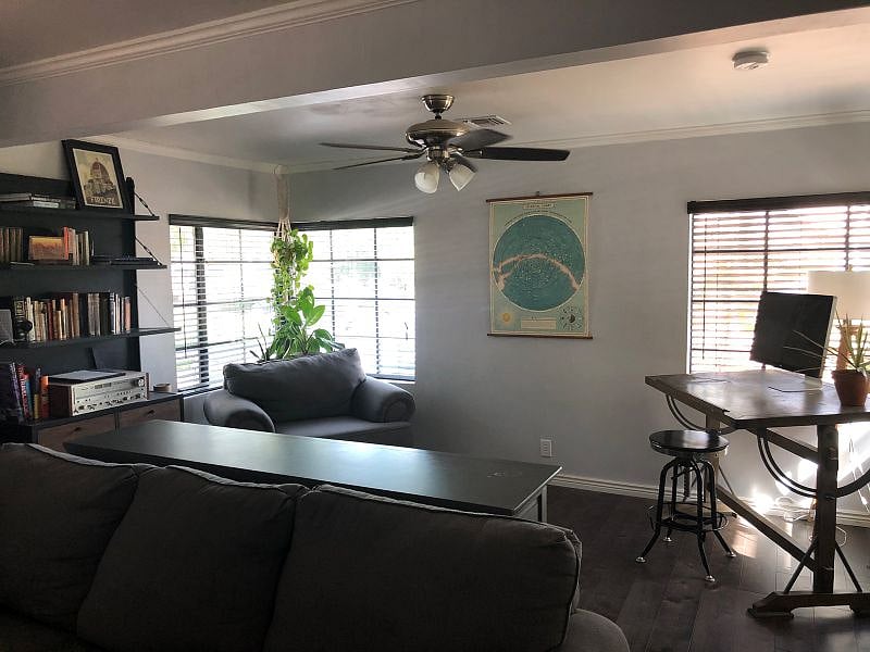Office/Reading room. Sunlight filled with views of the beautiful palm tree-lined street.