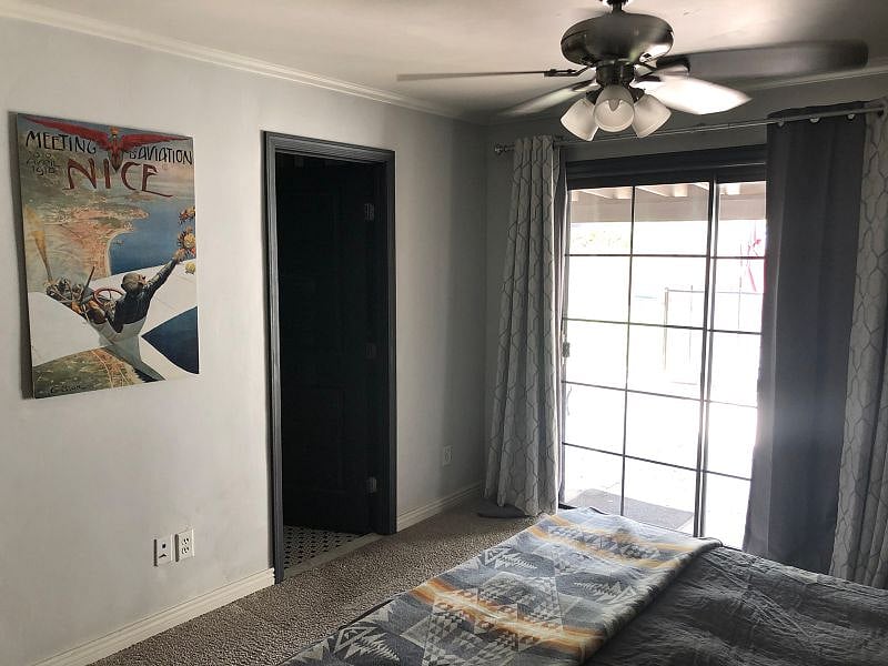Bedroom #2  Sliding door leads to the pool. Shady, cool, spacious and tons of closet/storage space.