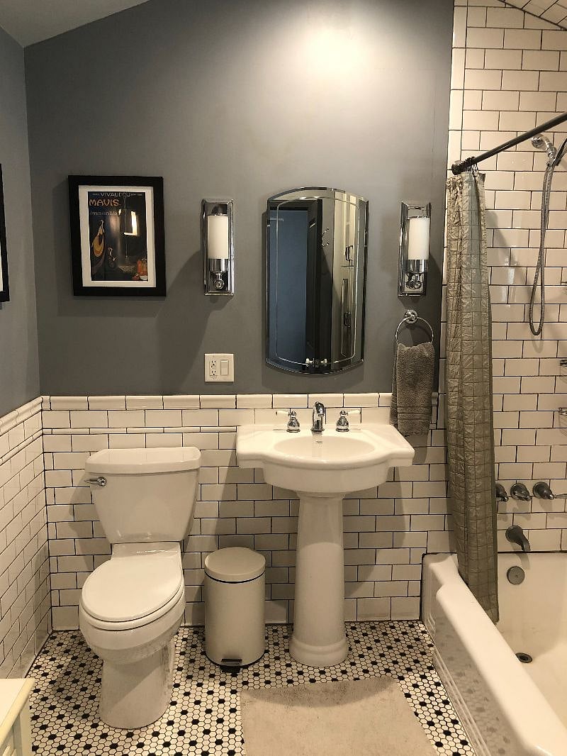Bathroom # 2  Sunken bathtub, large storage closet, vanity and luxurious fixtures.