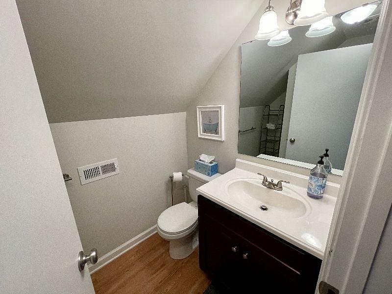 The upstairs full bathroom has a stall shower.