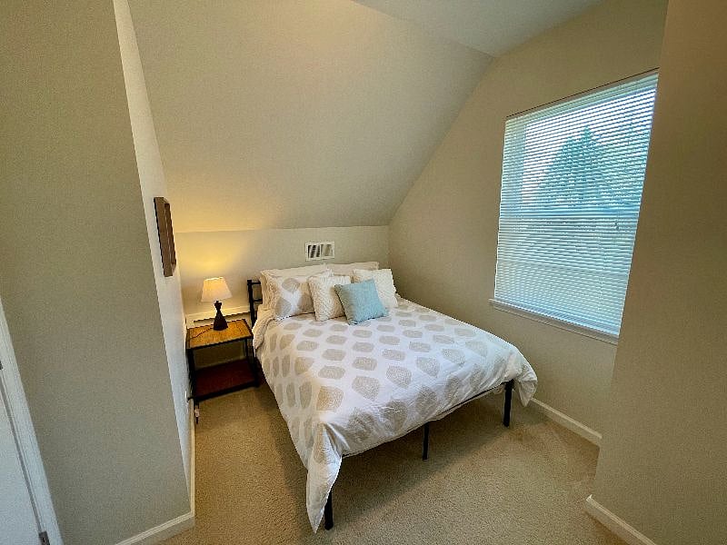 The second upstairs bedroom has a full-sized bed.