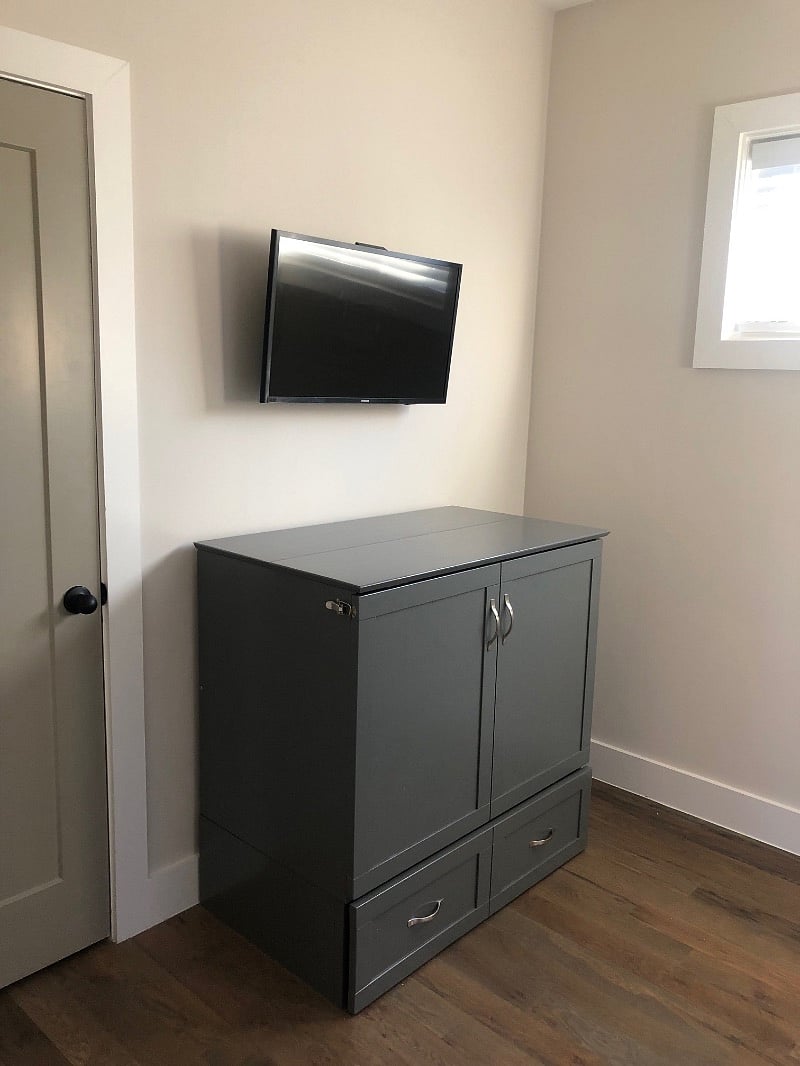 2nd Bedroom perfect for an office or bedroom! Equipped with Murphy bed and wall desk.