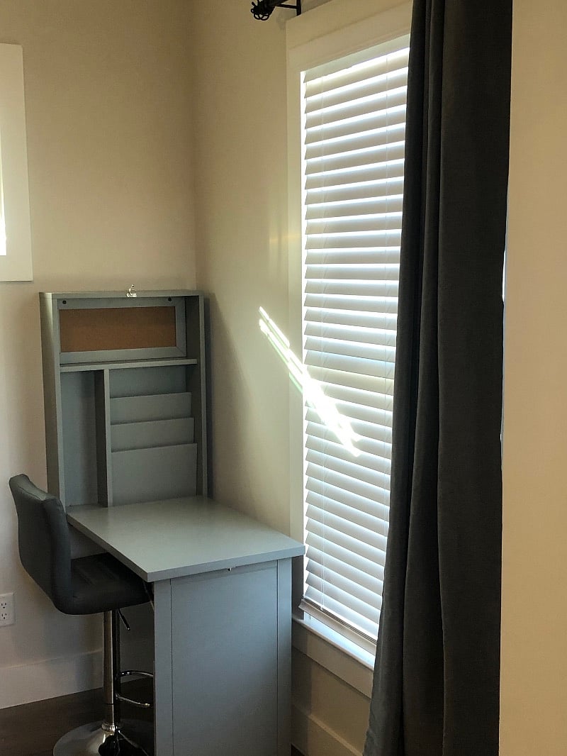 2nd Bedroom perfect for an office or bedroom! Equipped with Murphy bed and wall desk.