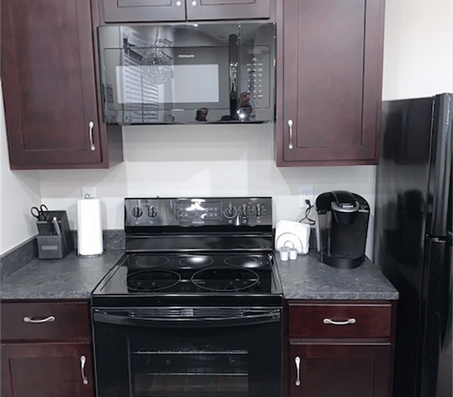 Fully equipped kitchen with Keurig coffee maker