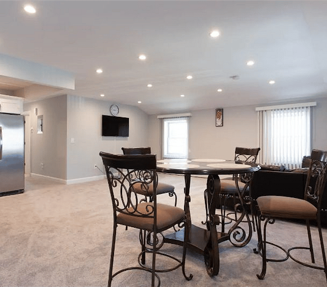 Open modern plan with dining table for four