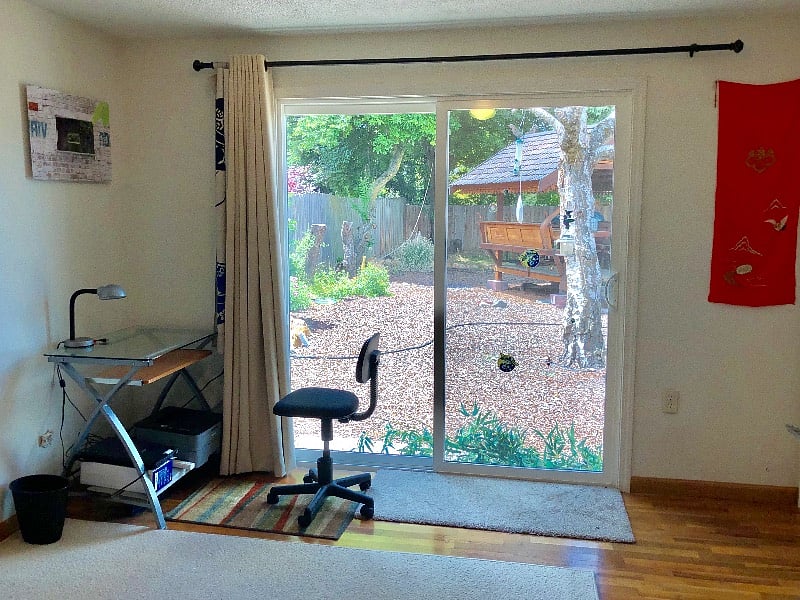 View to back yard from larger bedroom