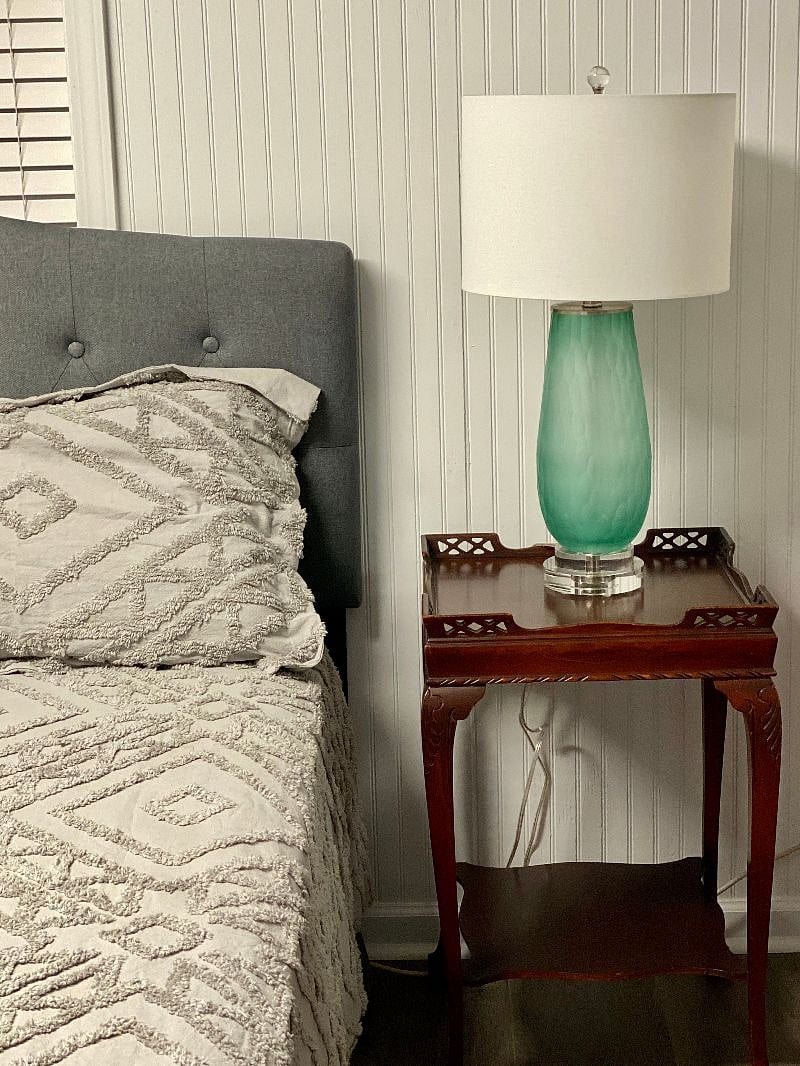 Spacious and cozy bedroom with nightstands and lamps