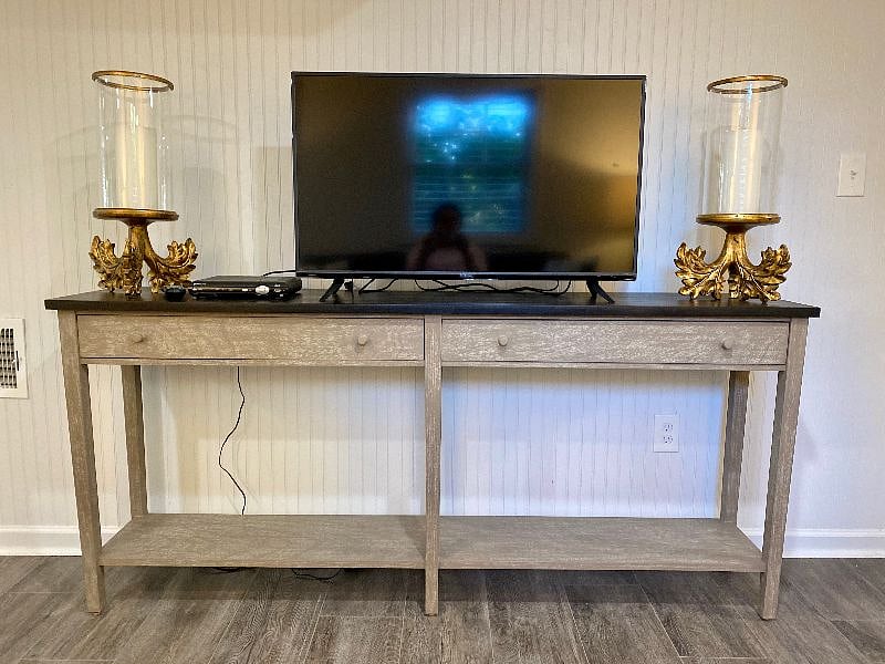 Settle in and watch a movie on the flat screen TV