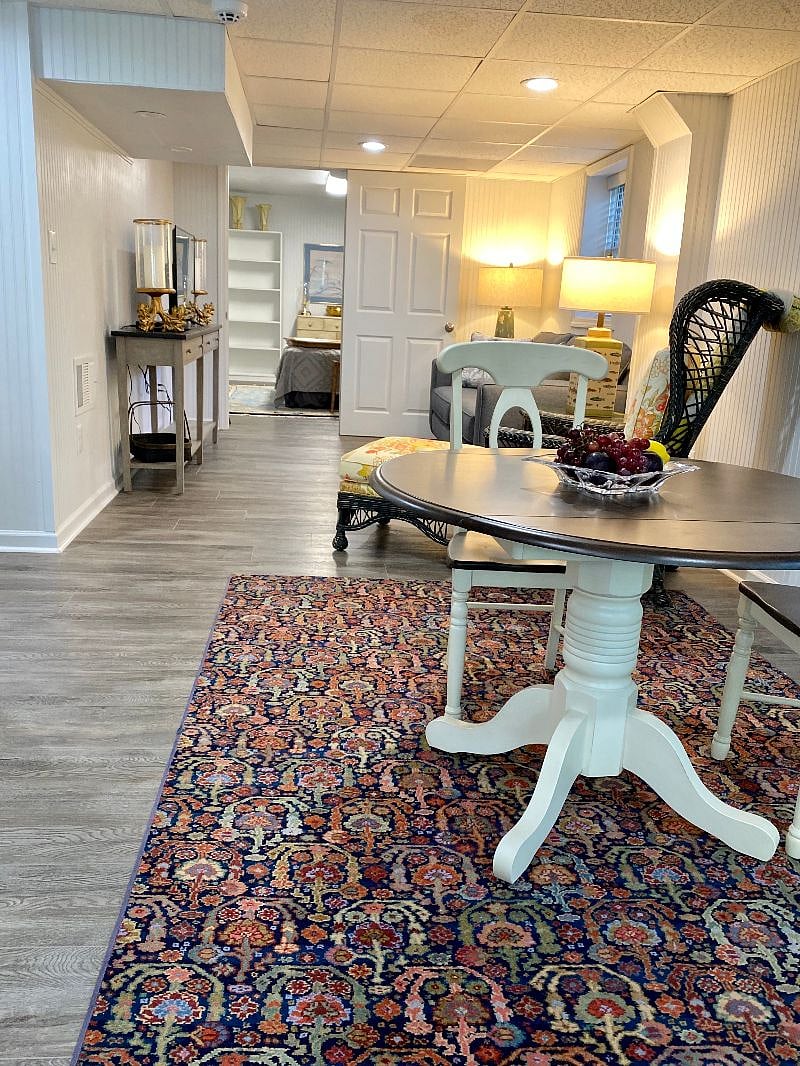 Open modern living and dining area with access to the bedroom 