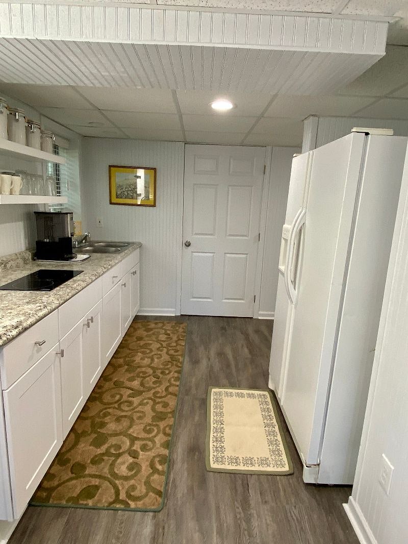 Fully stocked kitchen with updated appliances and full size fridge