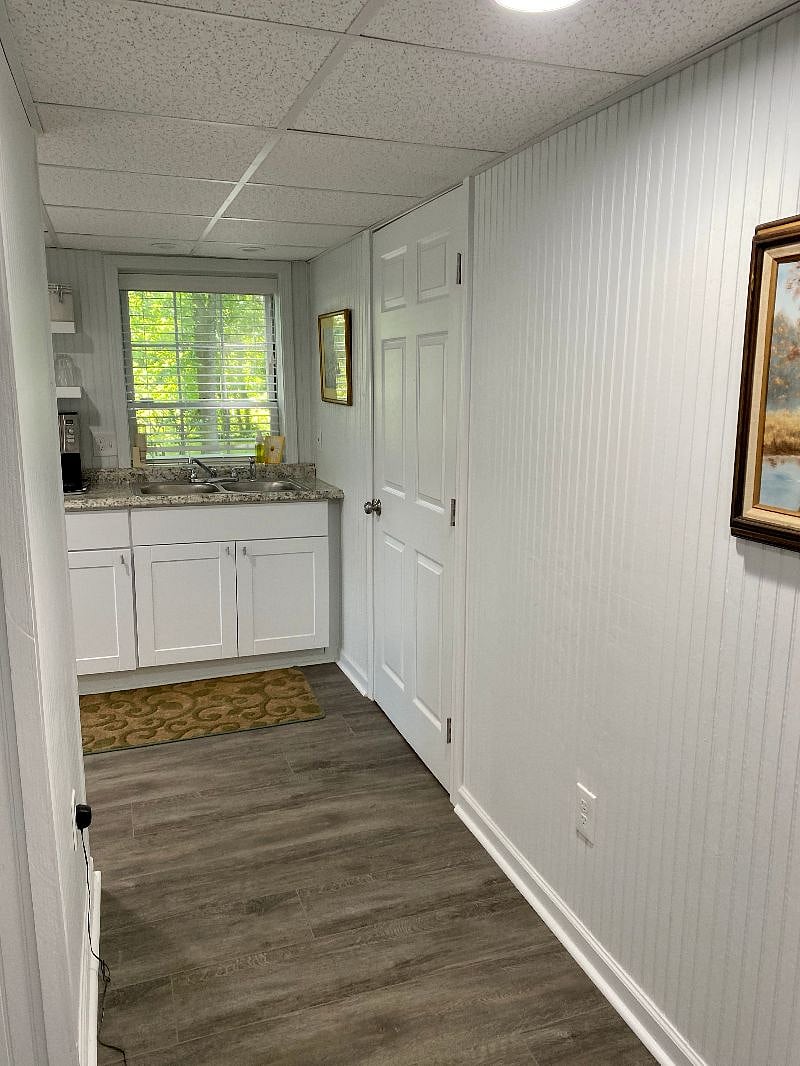 Ample kitchen with outside deck with views