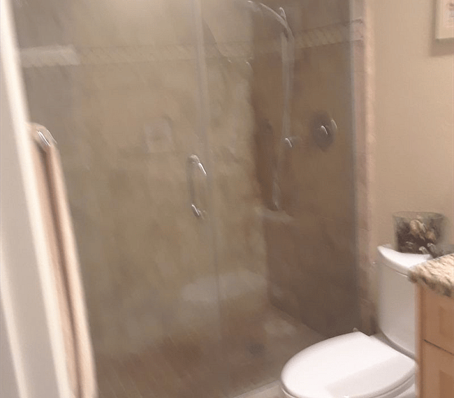 A shower features in the bathroom 