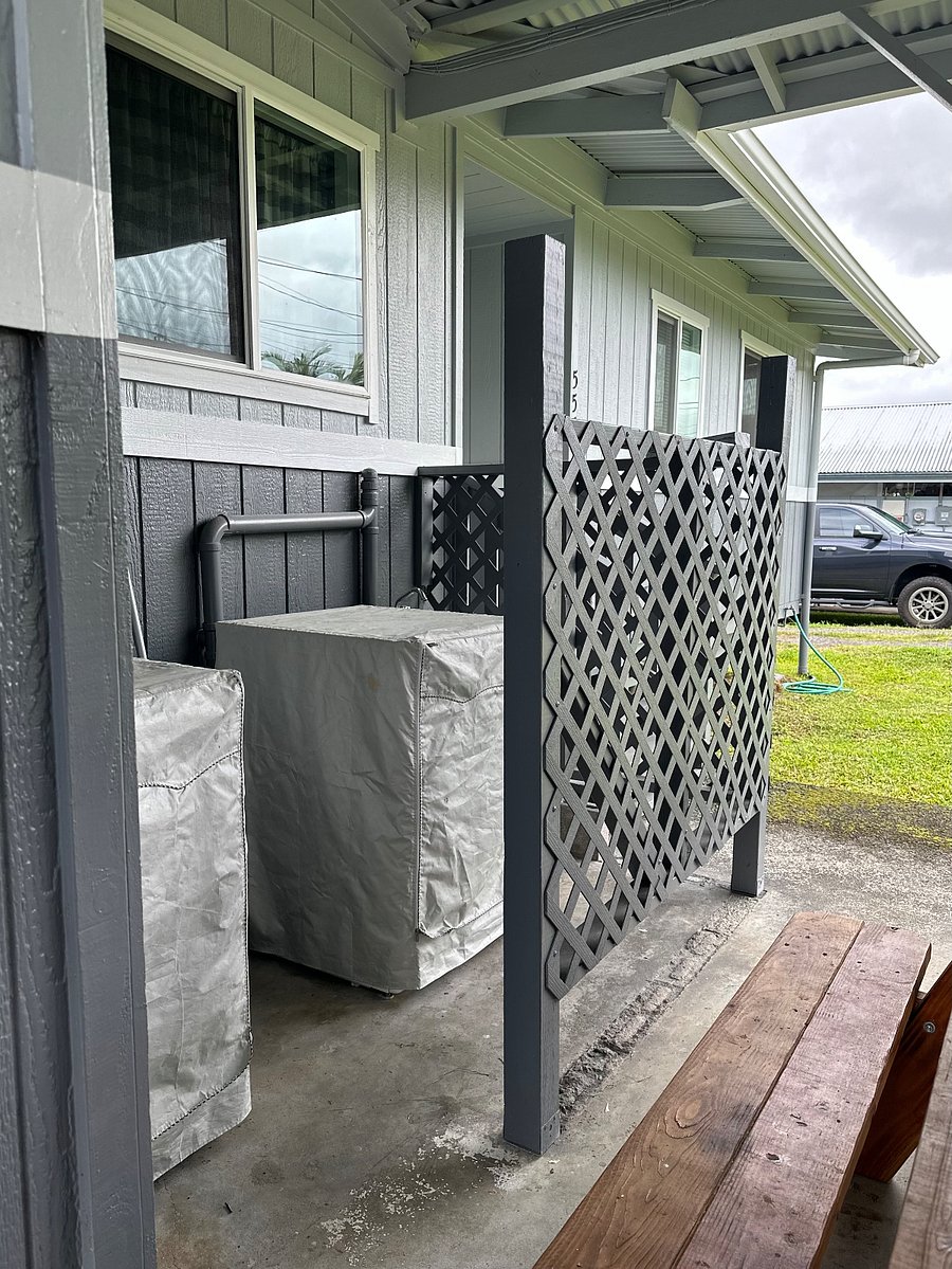 Laundry in carport.