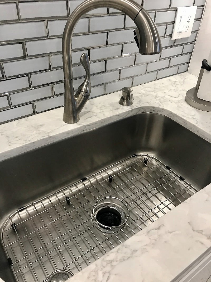Large stainless steel sink with garbage disposal