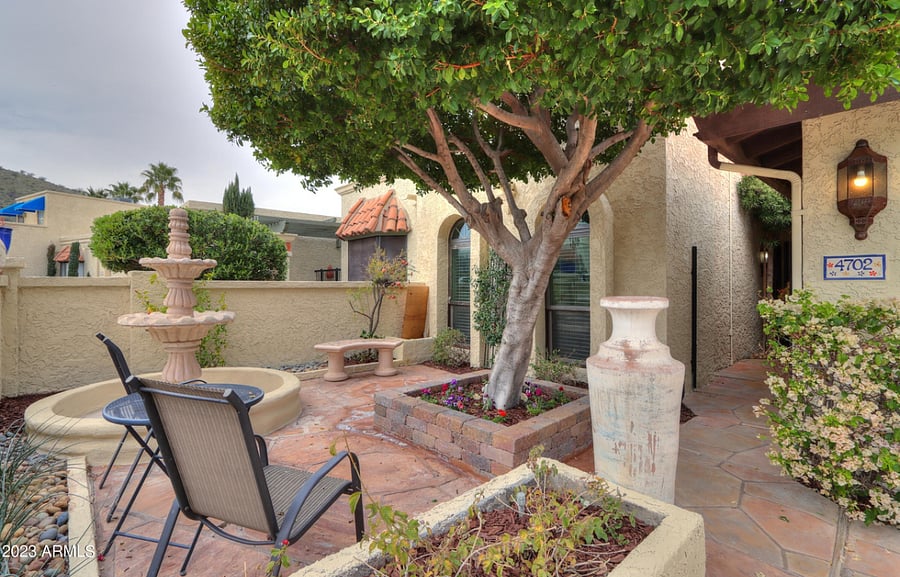 Front court yard with views of the mountain and shade from mature trees.