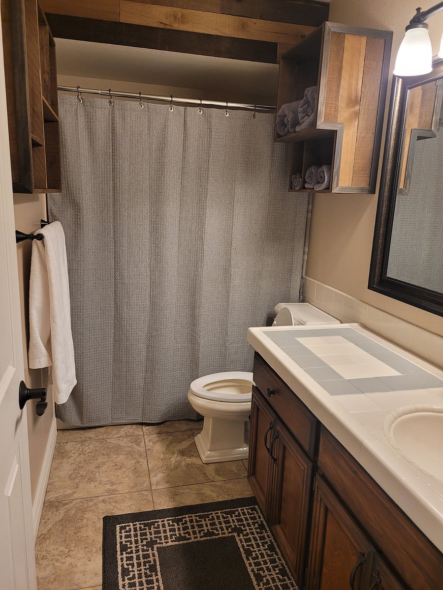 Bathroom on the main floor has a shower and tub.