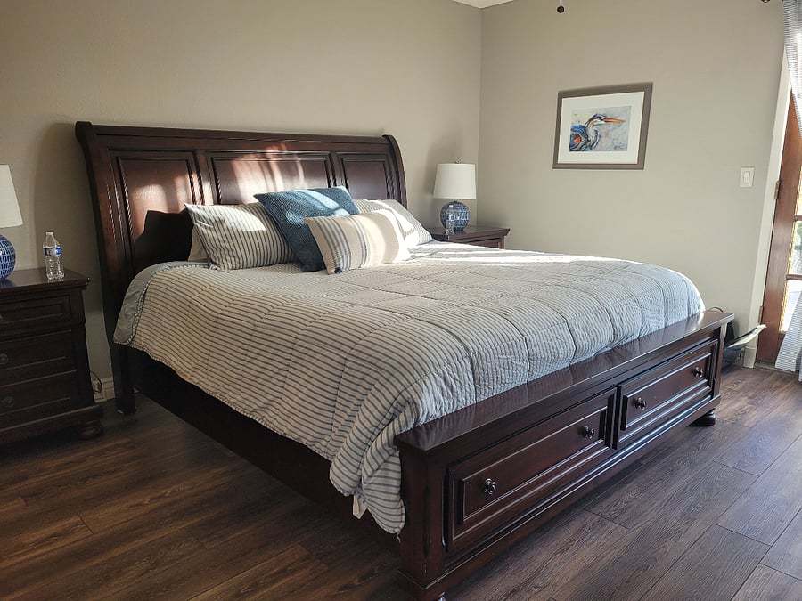 Spacious and beautiful master suite with French Doors opening to the pool.