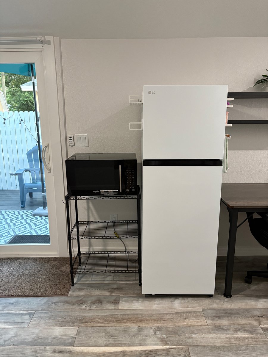 Brand new convection microwave and medium sized fridge.