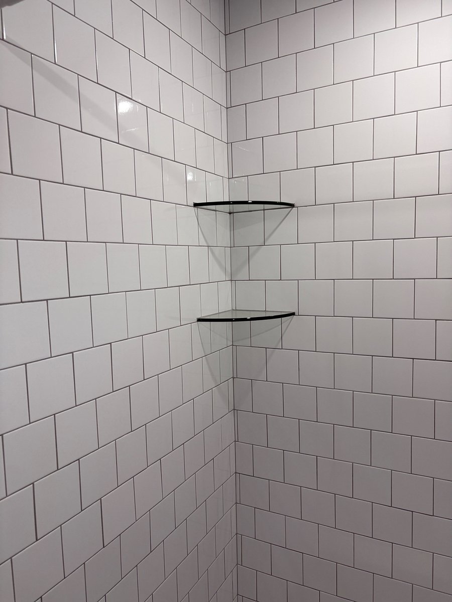 Brand new tiles! Shower has never been used. 2 Glass shelves for your soaps and shampoos. 