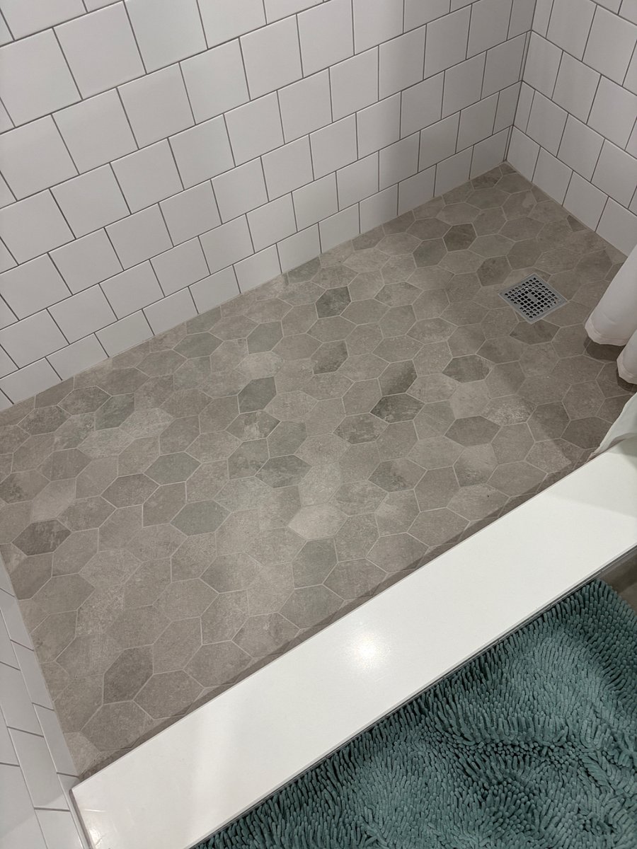 Brand new tiles in shower.