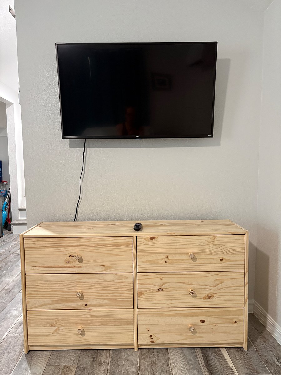 43" TCL wall mounted TV. Just log in and access your apps! 