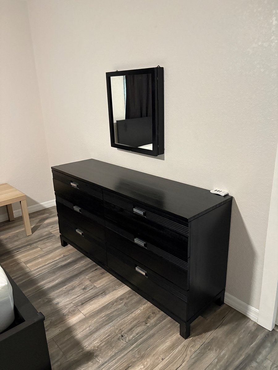 6 drawer dresser in big bedroom with king size bed