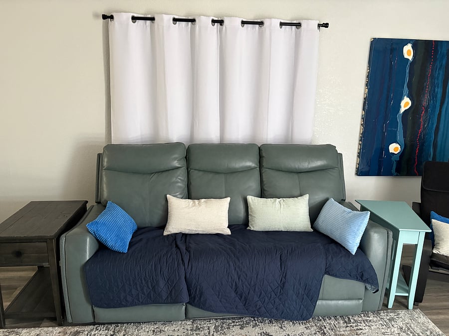 Living room, with couch, 2 recliners on each end; lounge chair 