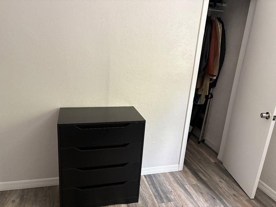 2nd smaller bedroom dresser and closet