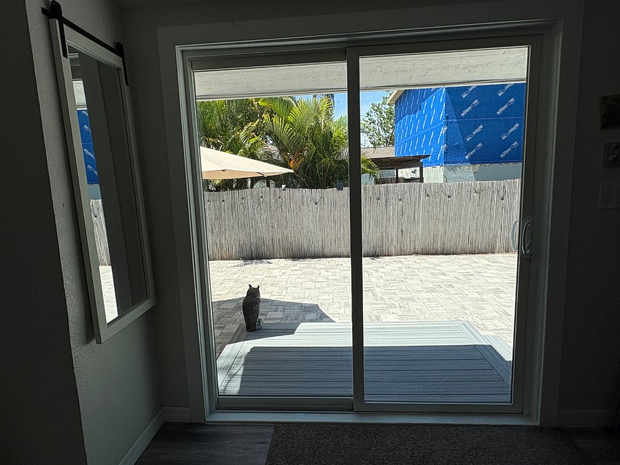 Sliding doors, entry way from driveway in the back