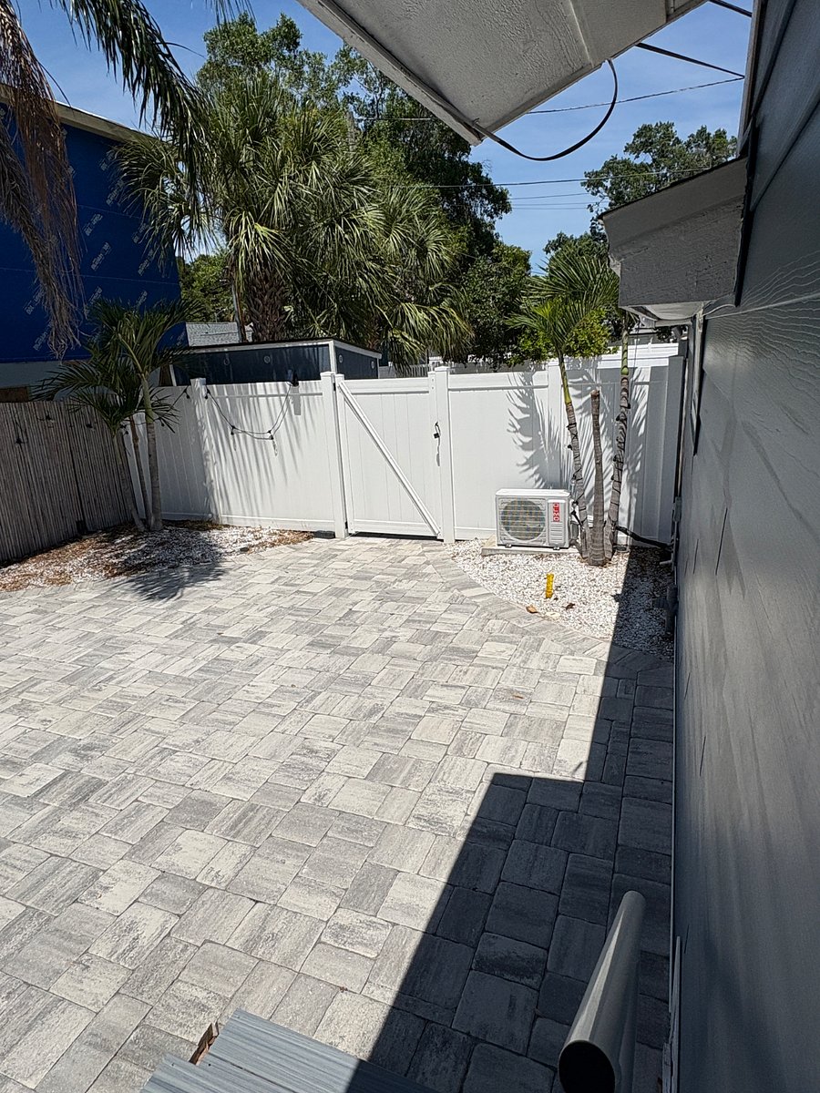 Entry from the driveway. patio pavers. 