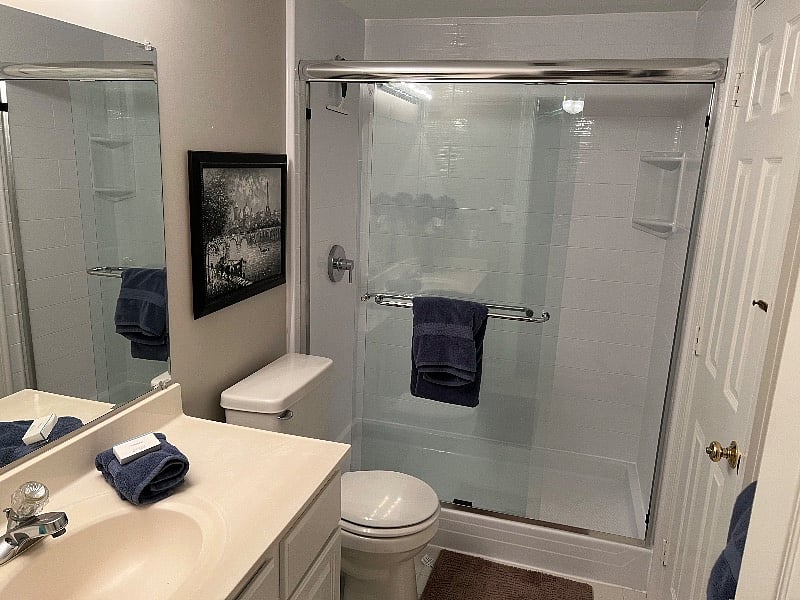 Bright bathroom with extra large shower