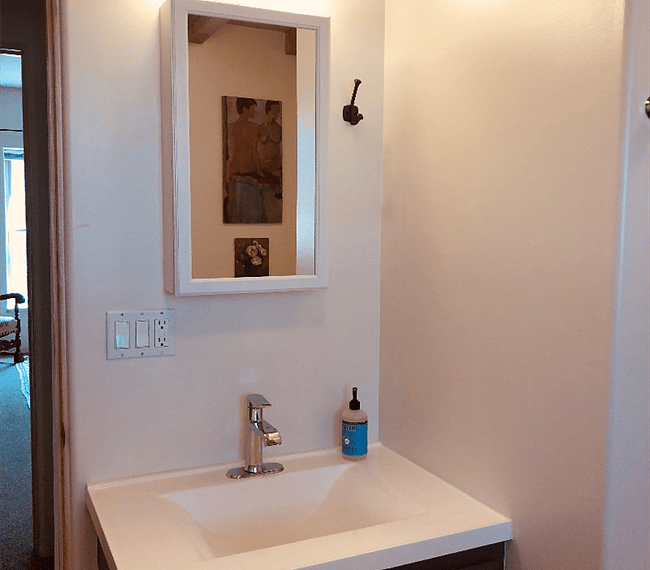 Bath with shower and separate tub