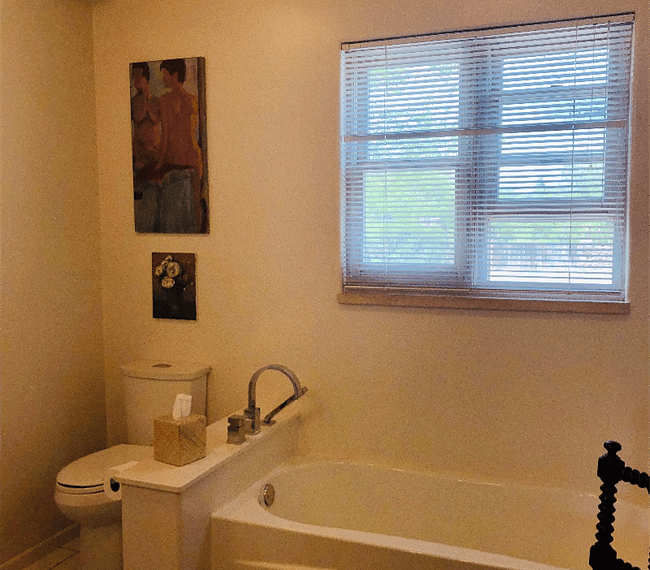 Bath with soaking tub