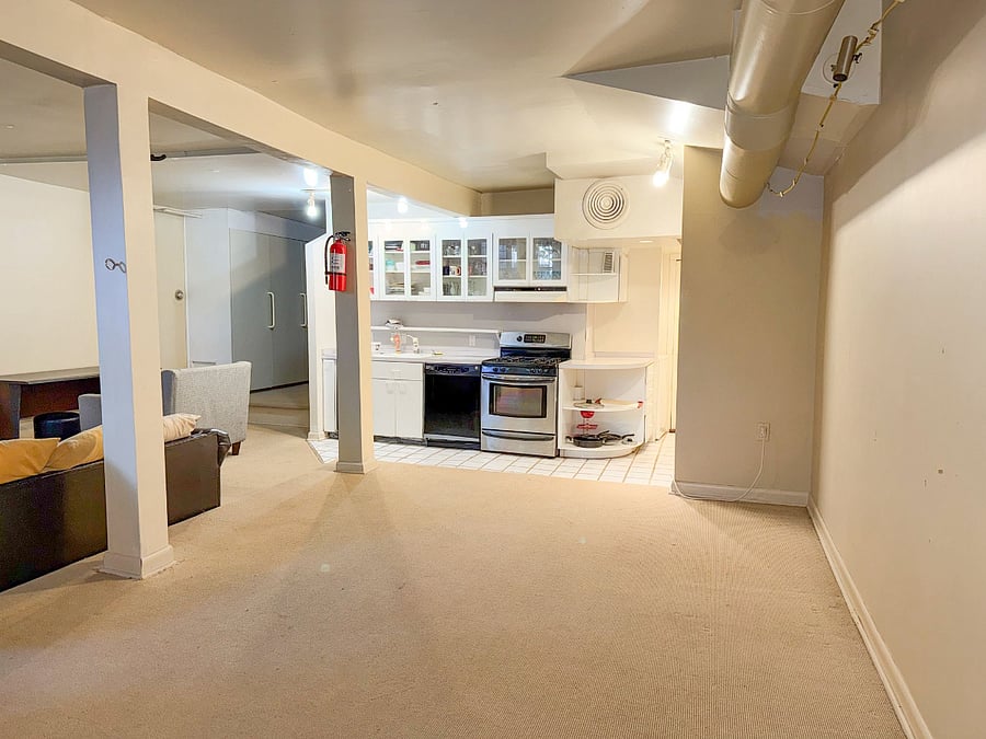 Large entrance open concept kitchen and sunken living area