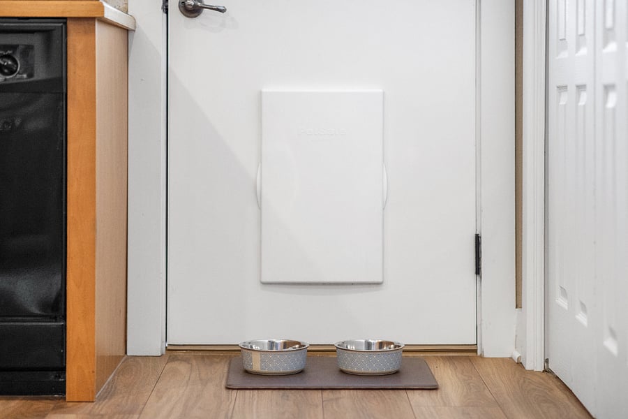 Dog door and dog bowls ready for your furry family members!