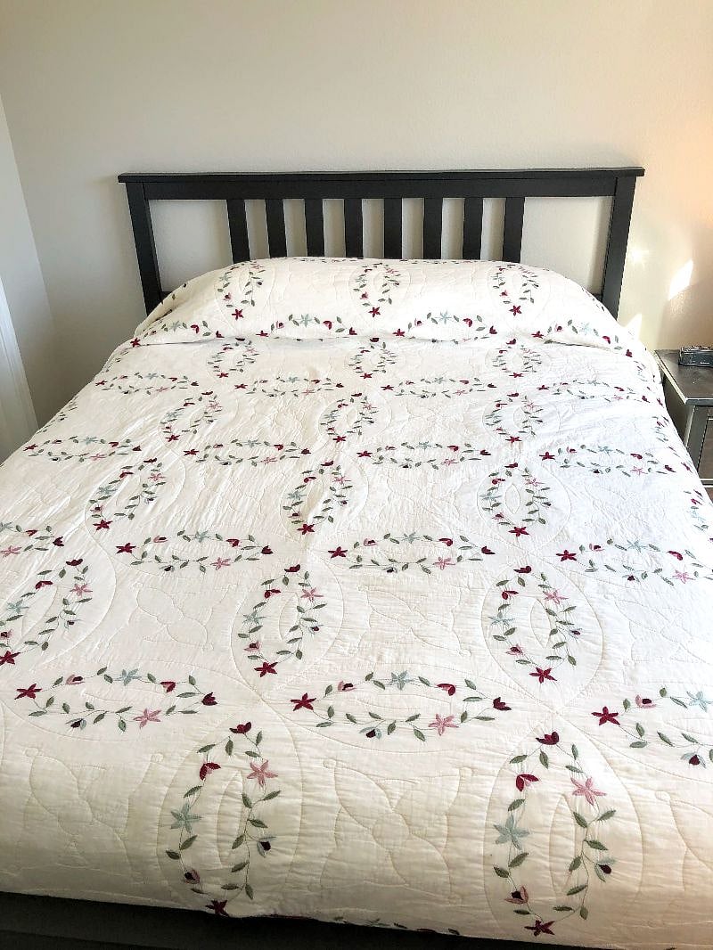 A luxurious, high-end Queen mattress ensures deep, restorative sleep.