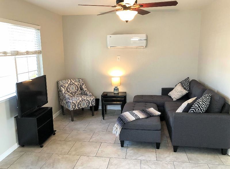 Relax after a long day in your pretty, comfortable living room.