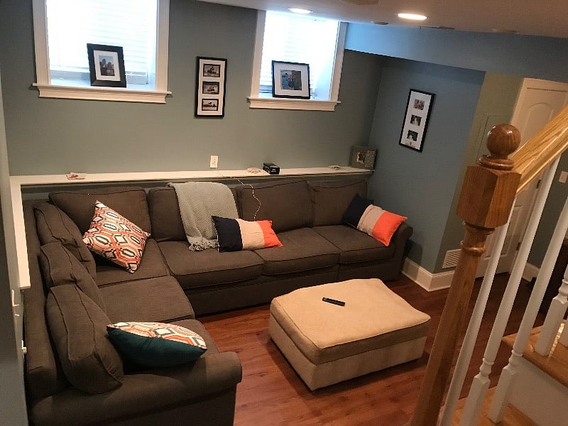 Garden level but you can see there is a lot of natural light.
Sectional couch with a pullout bed
