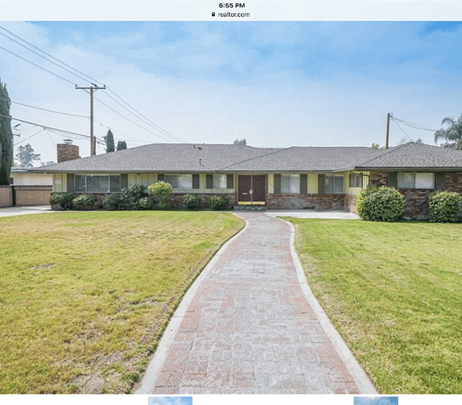 Property  located on a half an acre property with huge parking at the back. 