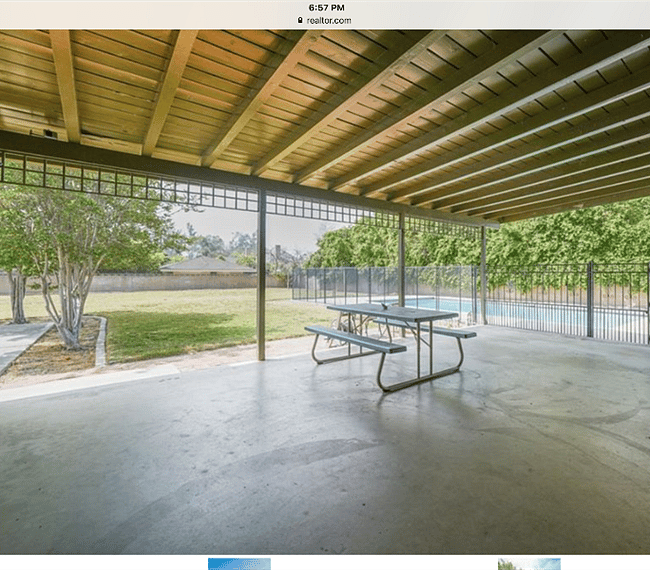 Patio and now with added gazebo. and Fenced pool