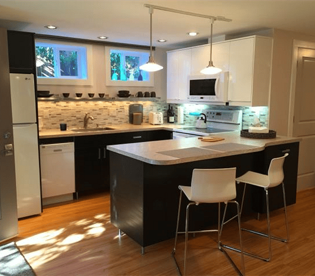 Full kitchen with everything you need to cook a meal-- including spices.