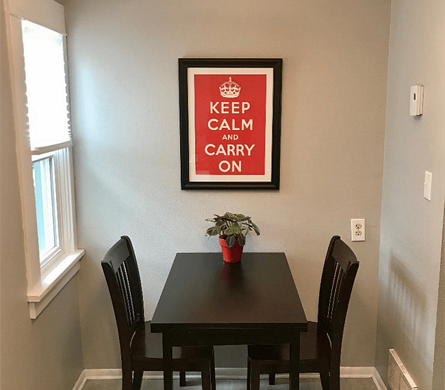 Dining nook in kitchen; table expands if needed