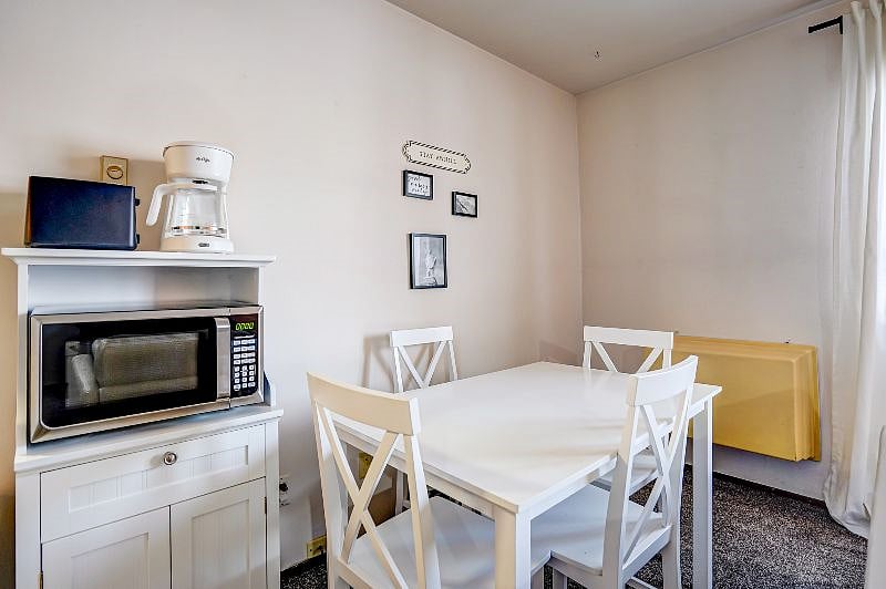 Dining area with Microwave and Coffee Maker.