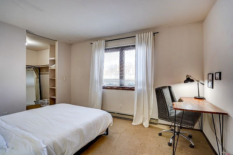 Bedroom includes a work desk and huge walk in closet with shelving!