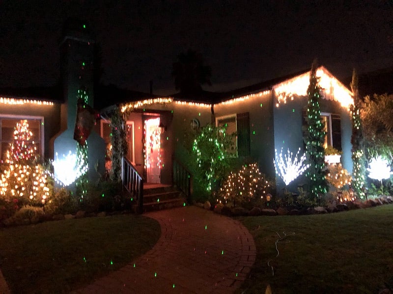 Festive December Christmas lights decorate the front yard of the main house each year!