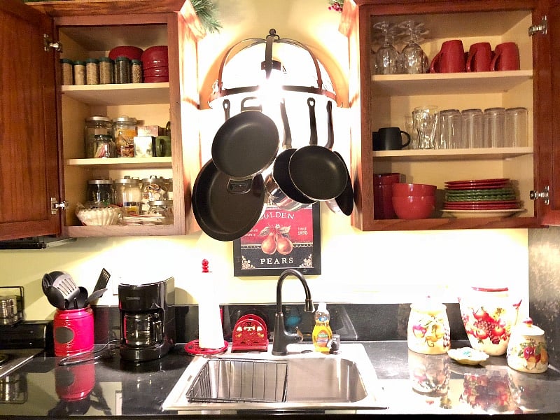 The kitchen is fully stocked with plates, bowls, mugs, glassware, silverware, cooking utensils, toaster, crock pot, tea kettle plus Keurig (and traditional) coffee makers.