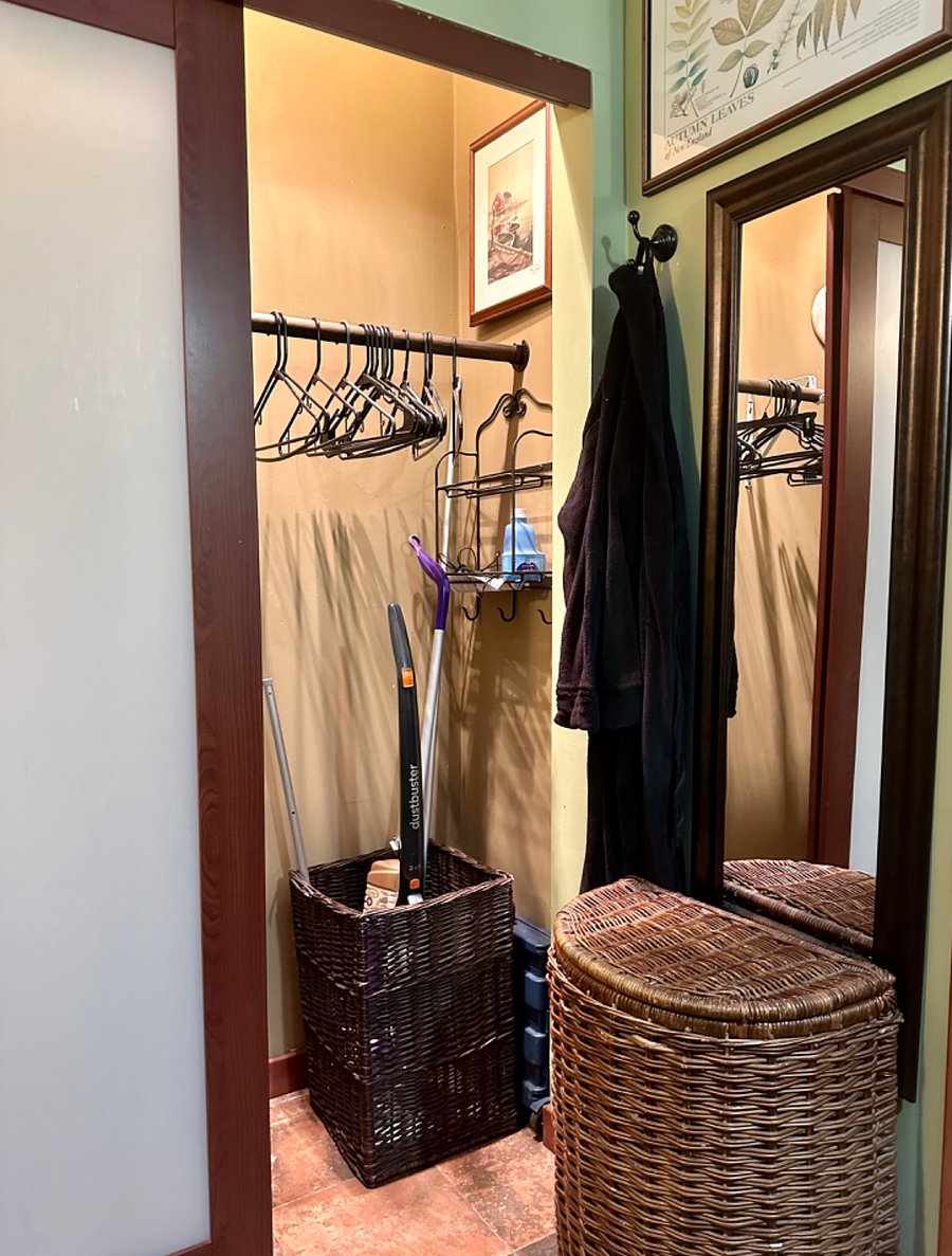 The bathroom closet also contains items such as a Swiffer mop and vacuum, to help guests keep their space clean and tidy for the duration of their stay.