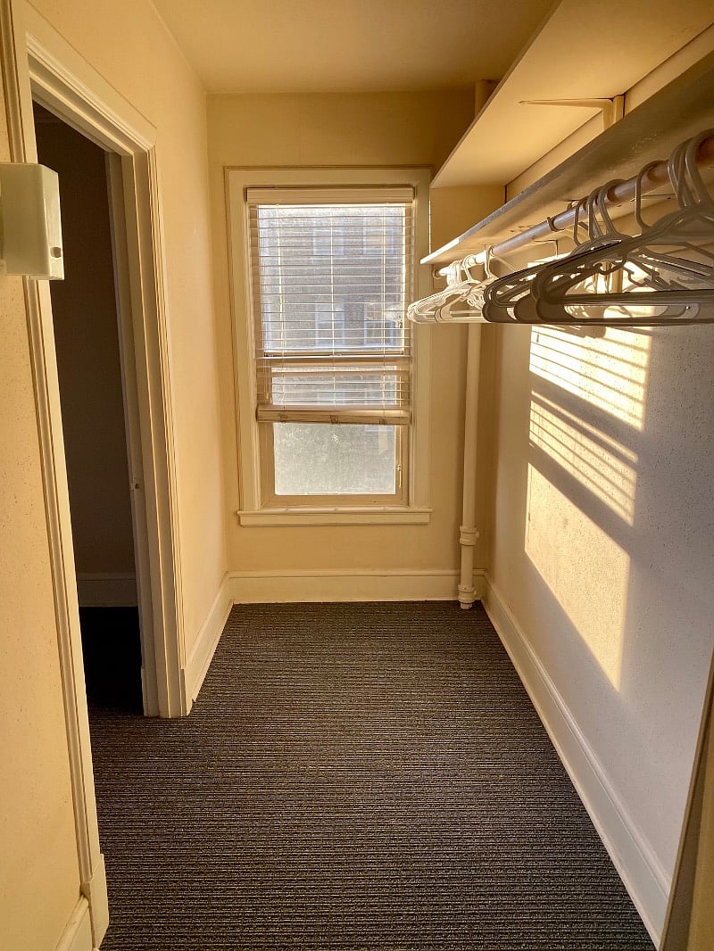 Huge walk-in closet with window 