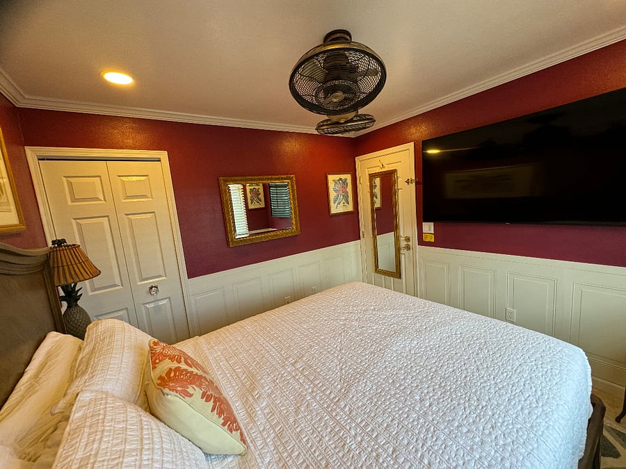 Private Bedroom features fully furnished with all bedding, Large T.V., several dressing mirrors, closet.